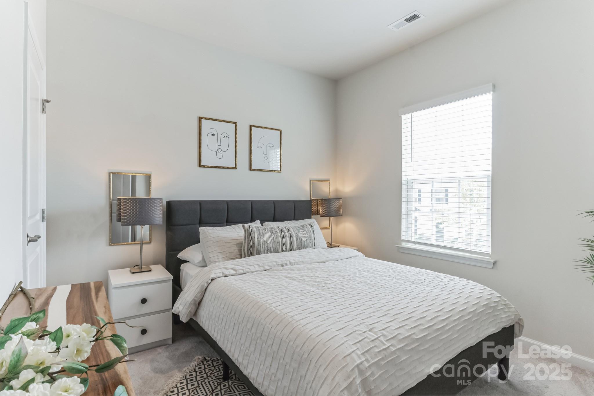 5048 Patton Dr. Gastonia, NC 28056 - Photo 26 of 37 a bedroom with a bed and a window