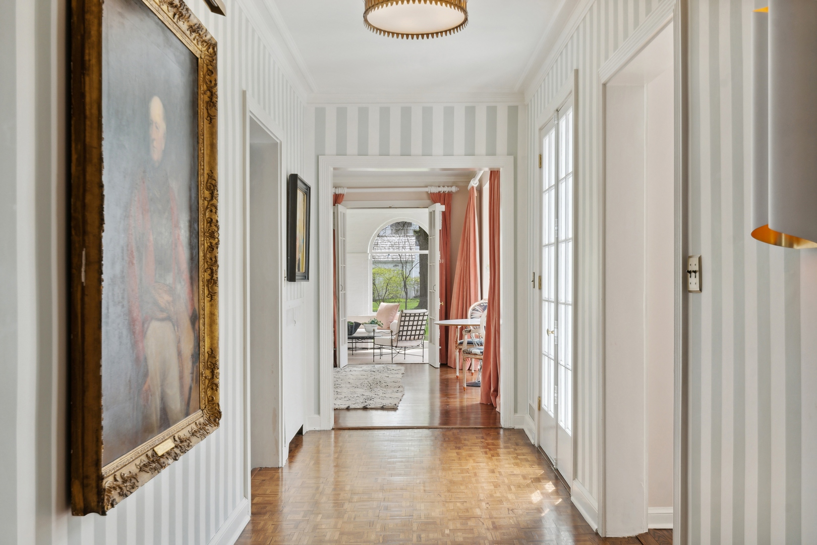 220 Dewindt Road Winnetka, IL 60093 - Photo 14 of 53 a view of a hallway with wooden floor and windows