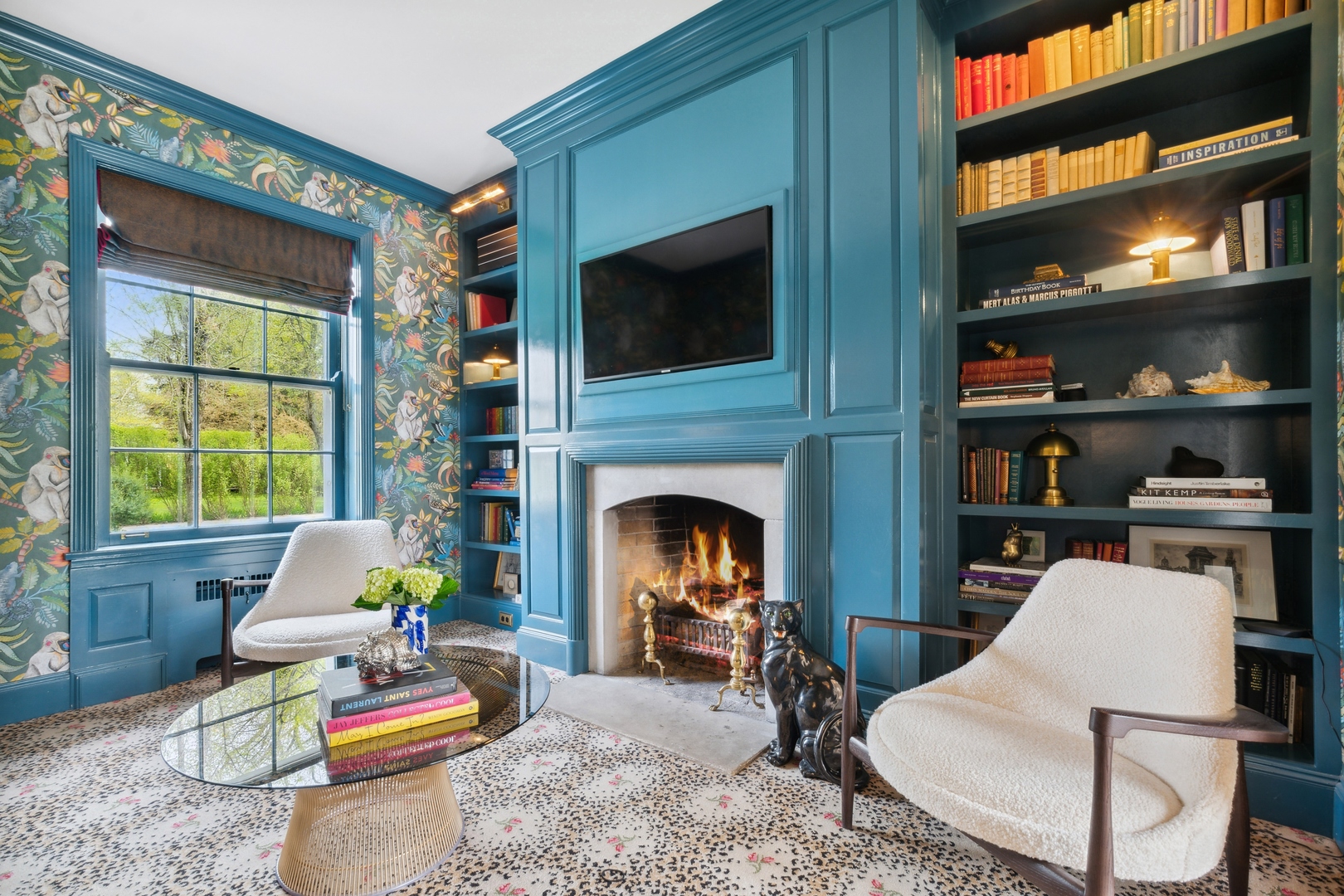 220 Dewindt Road Winnetka, IL 60093 - Photo 16 of 53 a living room with furniture and a fireplace