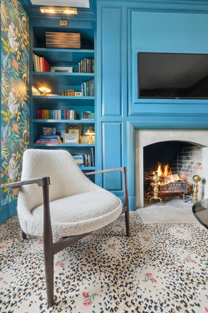 220 Dewindt Road Winnetka, IL 60093 - Photo 17 of 53 a living room with a fireplace