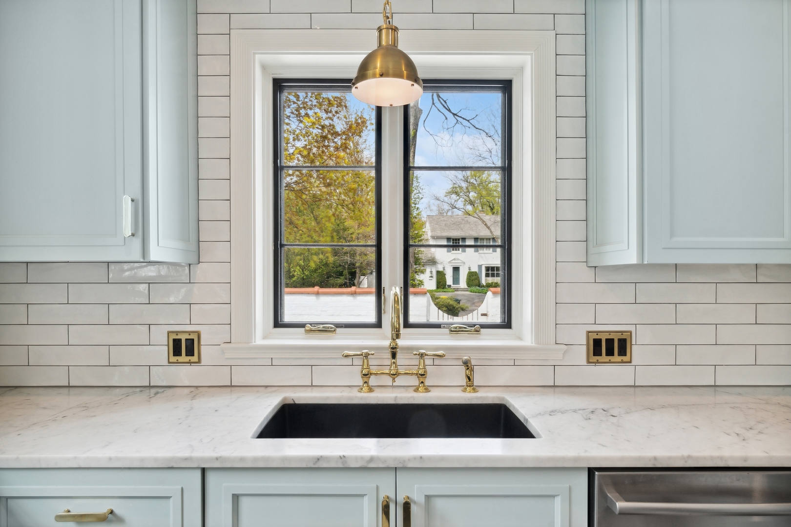 220 Dewindt Road Winnetka, IL 60093 - Photo 26 of 53 a kitchen with a sink and a window