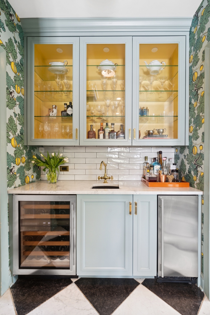 220 Dewindt Road Winnetka, IL 60093 - Photo 30 of 53 a kitchen with stainless steel appliances white cabinets and a large window