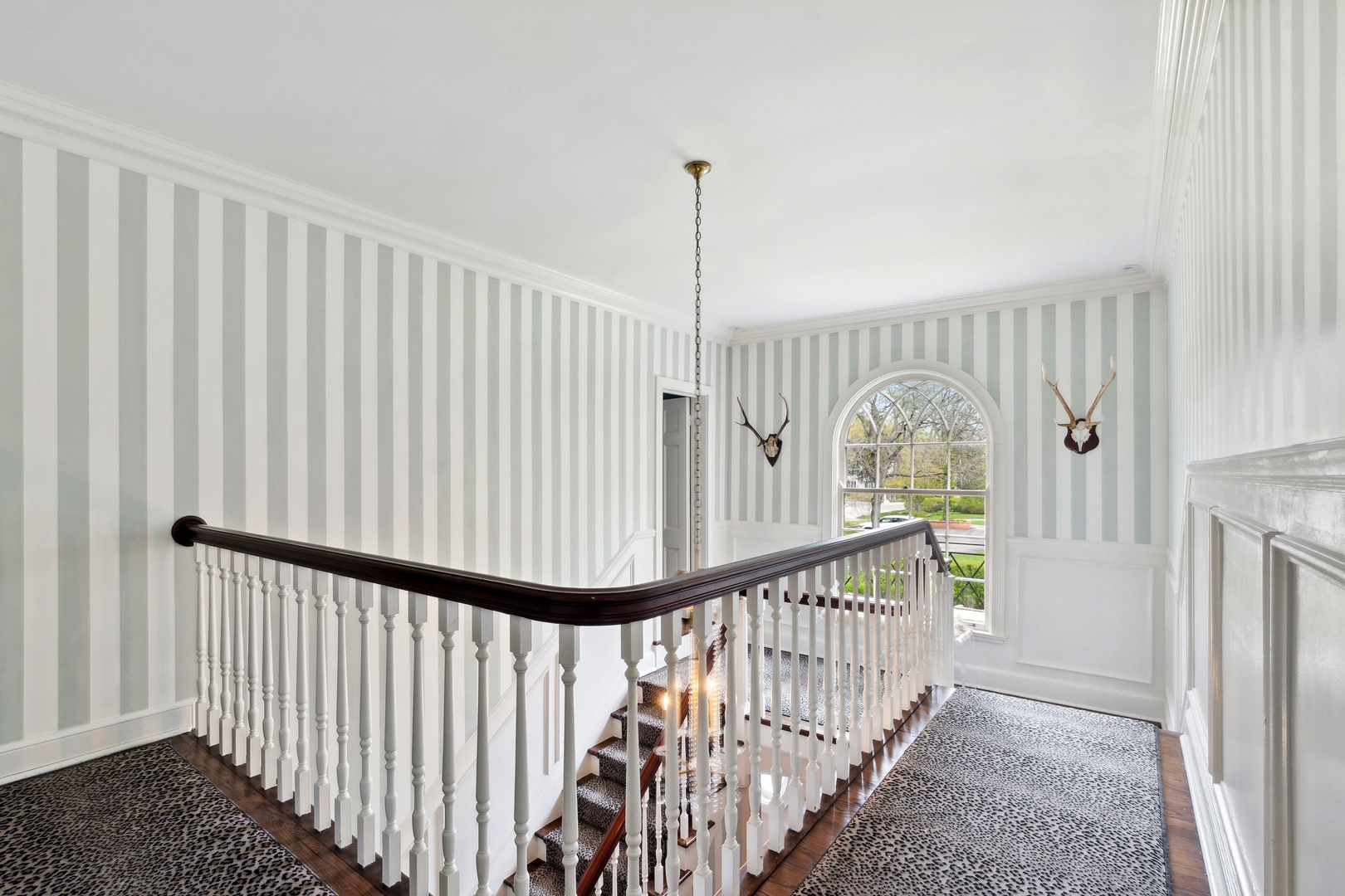 220 Dewindt Road Winnetka, IL 60093 - Photo 31 of 53 a view of a hallway view with staircase