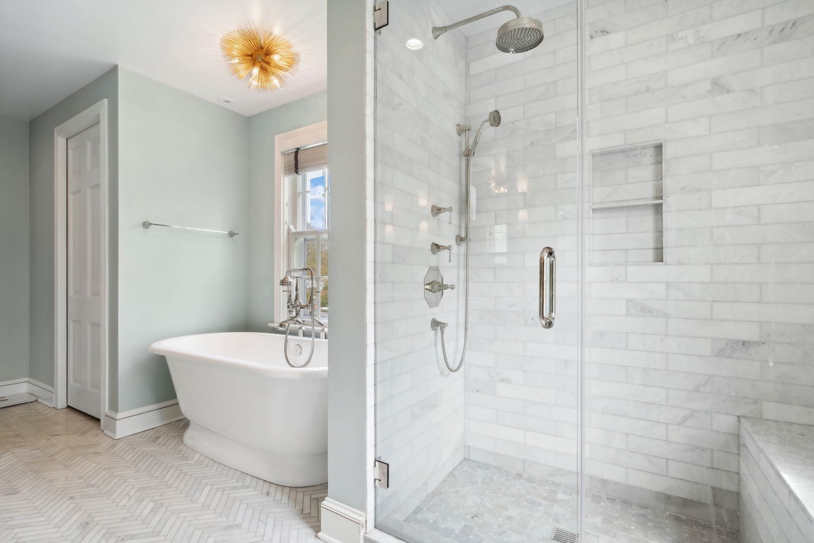 220 Dewindt Road Winnetka, IL 60093 - Photo 35 of 53 a spacious bathroom with a bathtub and shower