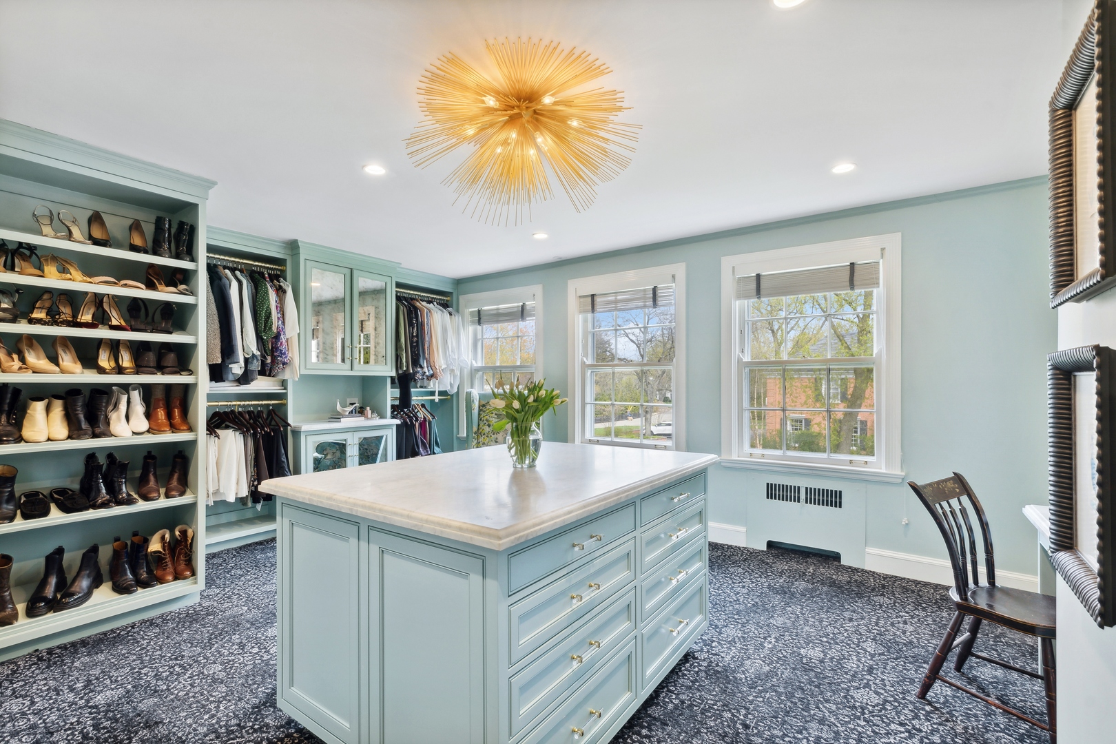 220 Dewindt Road Winnetka, IL 60093 - Photo 37 of 53 a living room with furniture and a book shelf