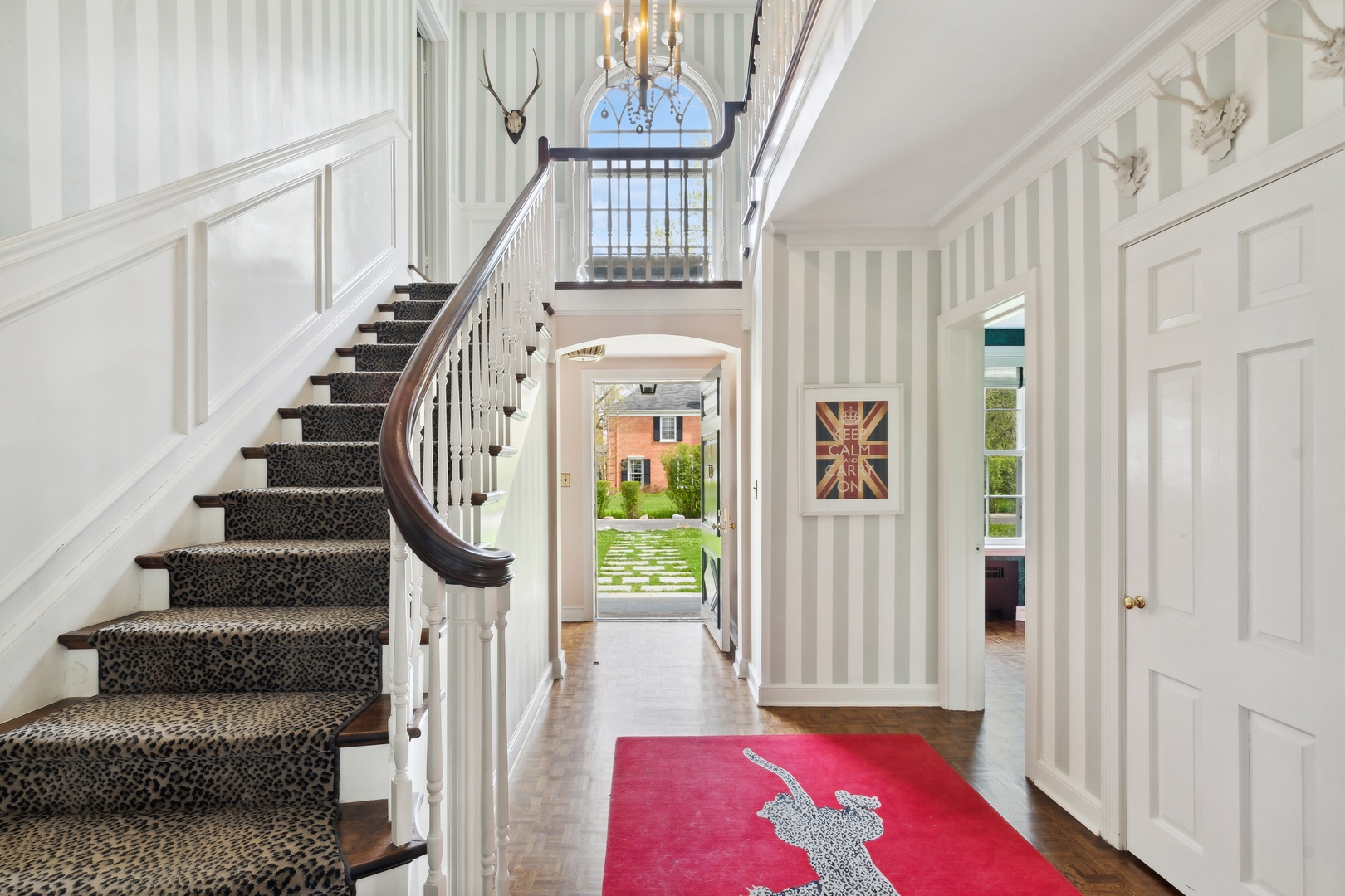 220 Dewindt Road Winnetka, IL 60093 - Photo 4 of 53 a view of entryway livingroom and hall with wooden floor