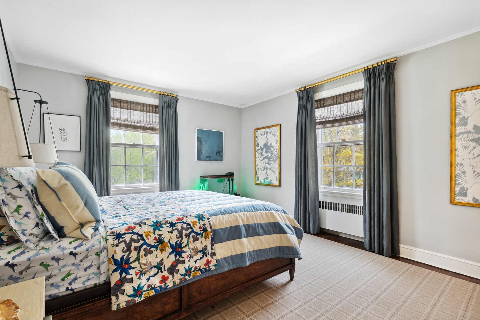 220 Dewindt Road Winnetka, IL 60093 - Photo 41 of 53 a bedroom with a bed lamp and a window