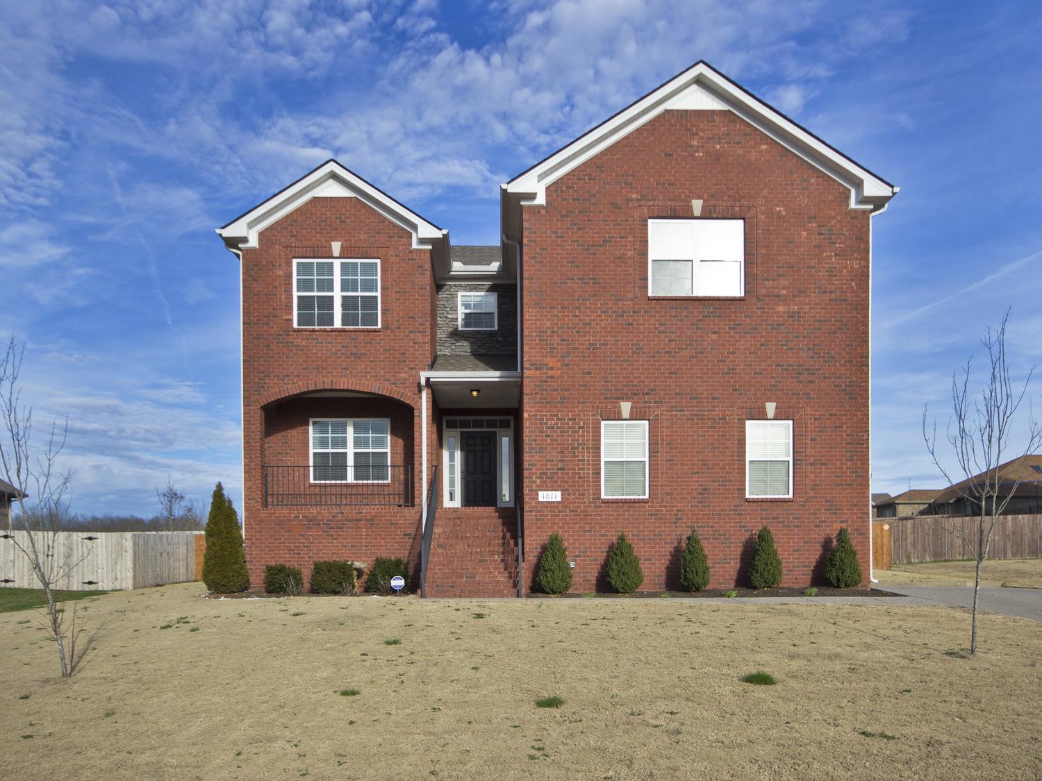 1011 Kyle Road Spring Hill, TN 37174 - Photo 1 of 30 a front view of a house with a yard