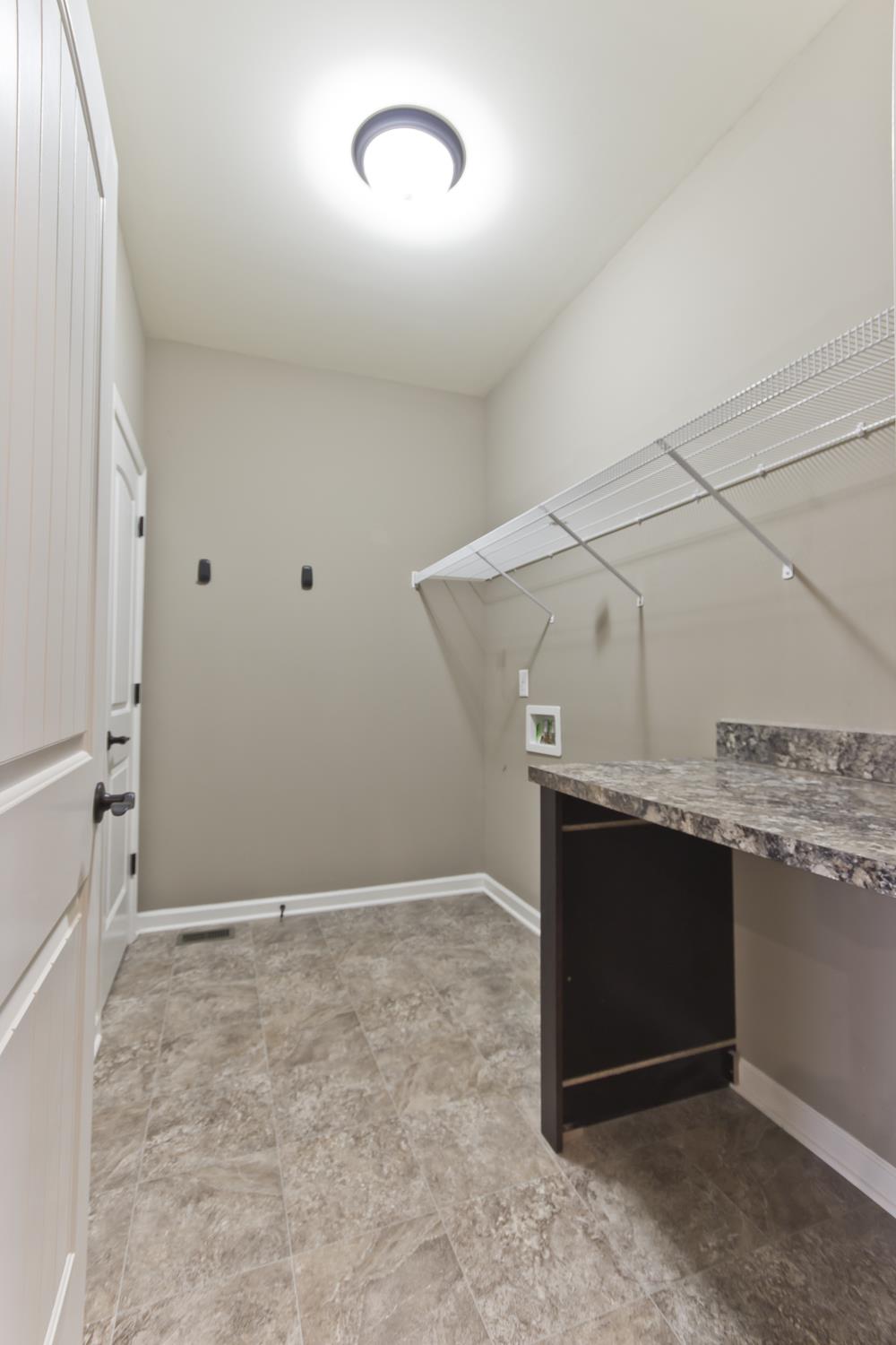 1011 Kyle Road Spring Hill, TN 37174 - Photo 10 of 30 an empty room with windows