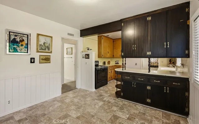 a view of a big room with windows and closet