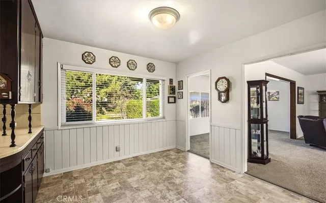 a kitchen with a sink stove and refrigerator