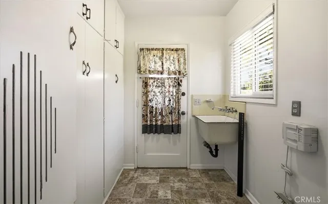 a view of a bathroom with a glass door