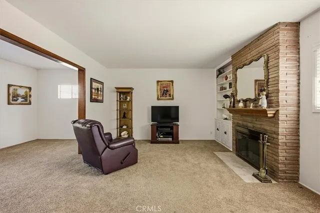 a view of a livingroom with a fireplace