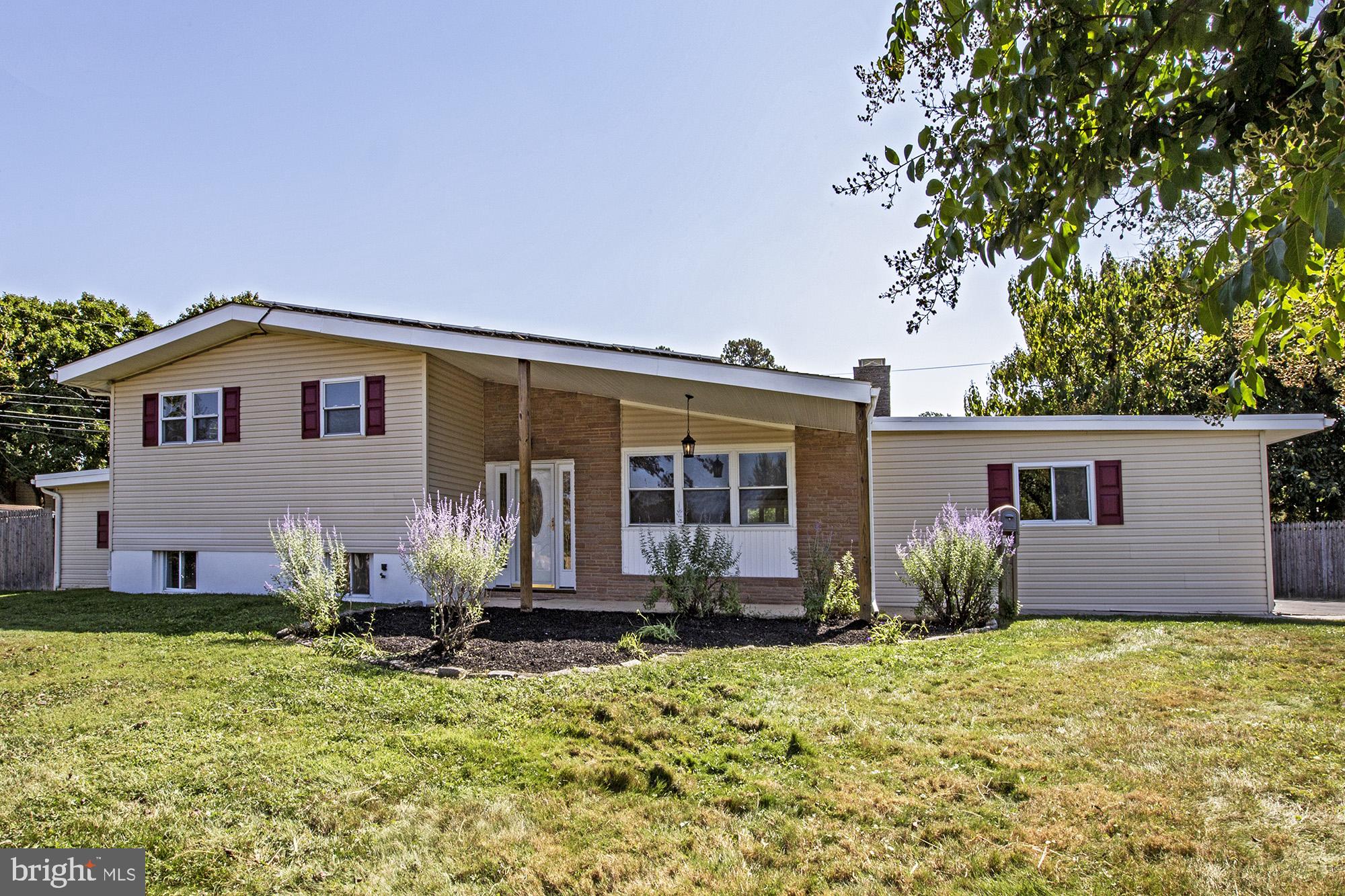 a front view of house with yard
