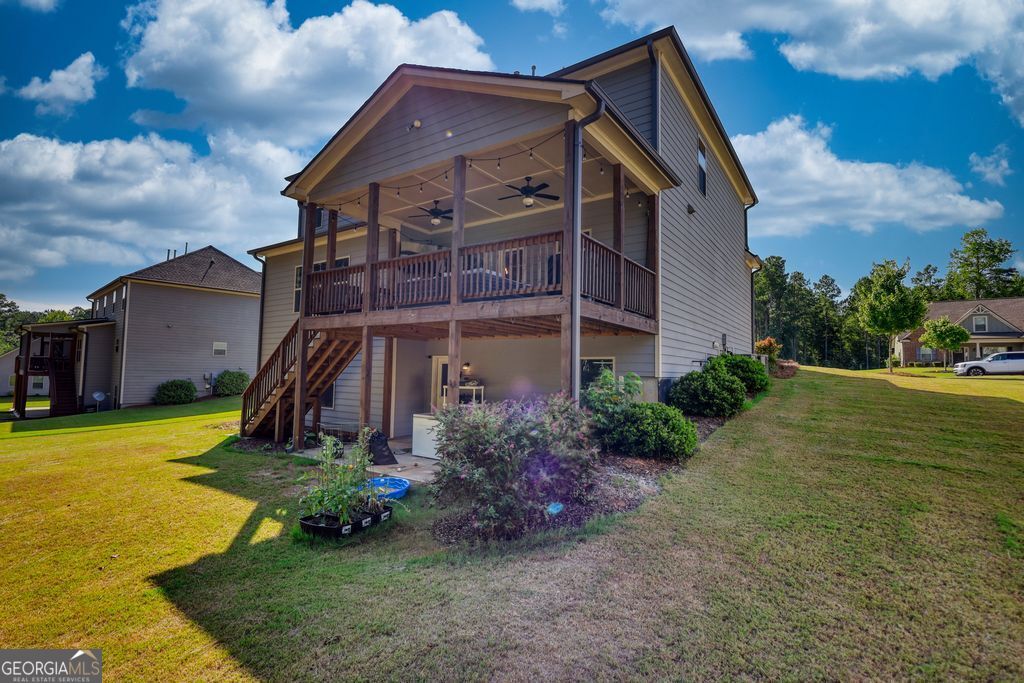 83 Bella Drive Monroe, GA 30655 - Photo 29 of 33 a view of a house with a yard
