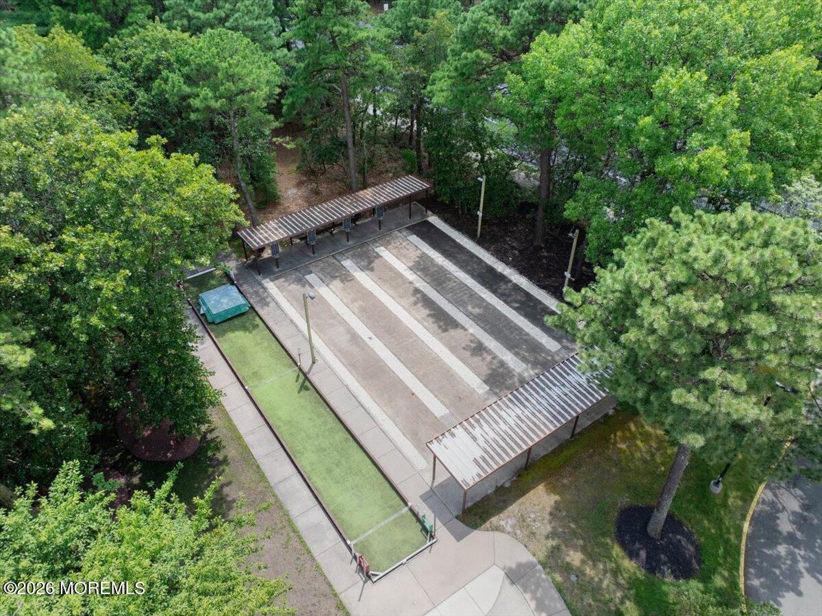 16 D Spring Street, Unit 50 Whiting, NJ 08759 - Photo 27 of 28 a view of a backyard with sitting area