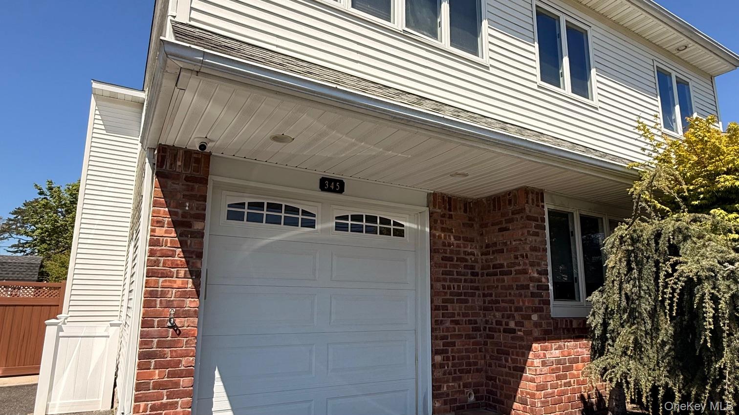 345 O'Connor Road North Babylon, NY 11703 - Photo 2 of 47 a front view of a building