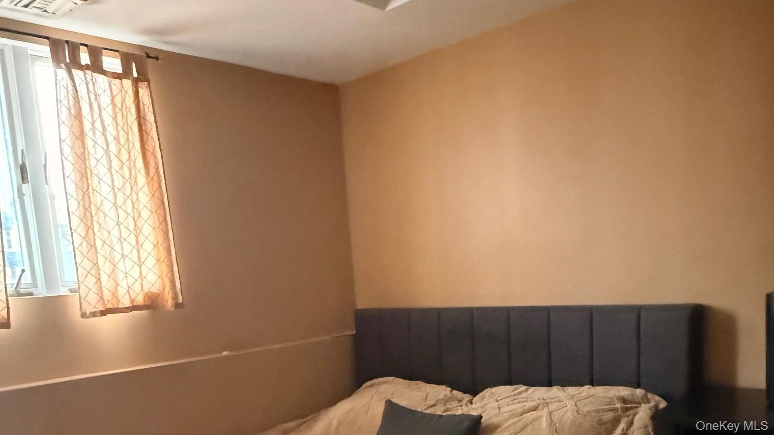 345 O'Connor Road North Babylon, NY 11703 - Photo 25 of 47 a view of bedroom with furniture and window