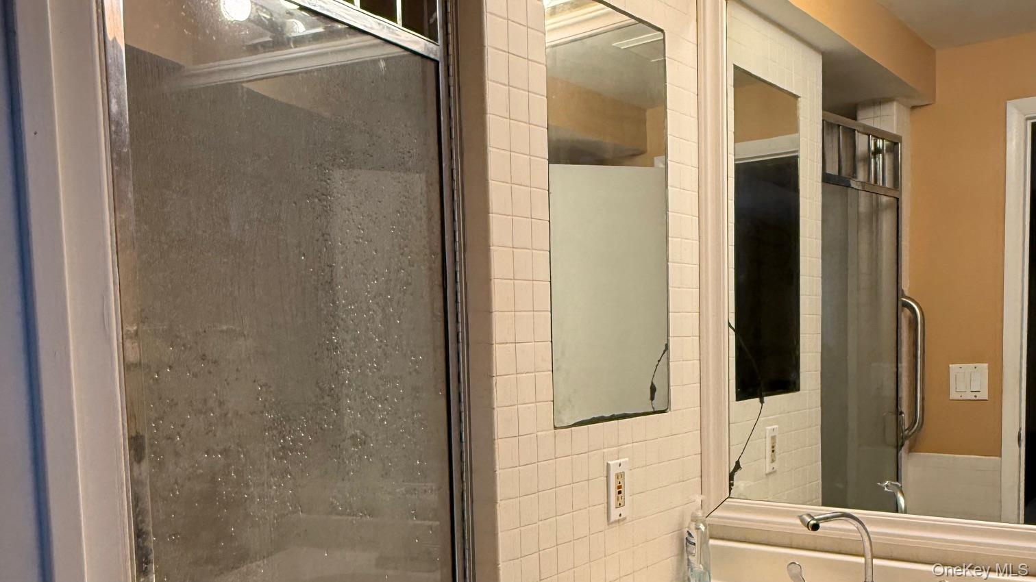 345 O'Connor Road North Babylon, NY 11703 - Photo 27 of 47 a bathroom with a tub and shower