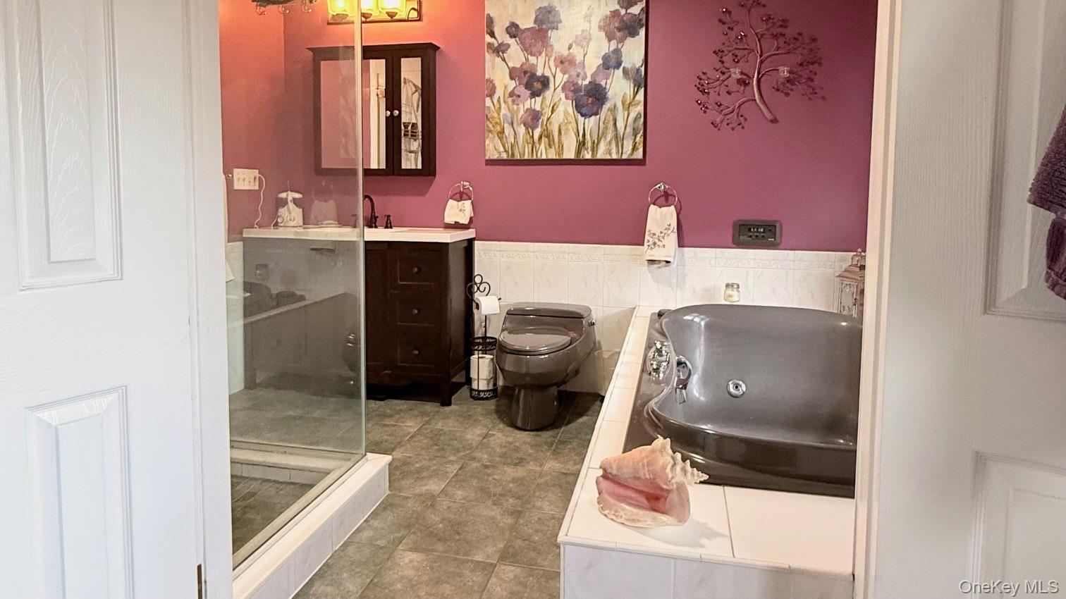 345 O'Connor Road North Babylon, NY 11703 - Photo 34 of 47 a bathroom with a toilet sink and mirror