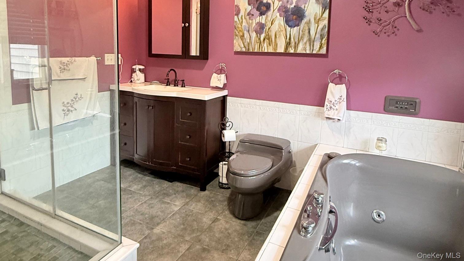 345 O'Connor Road North Babylon, NY 11703 - Photo 37 of 47 a bathroom with a sink a toilet and shower