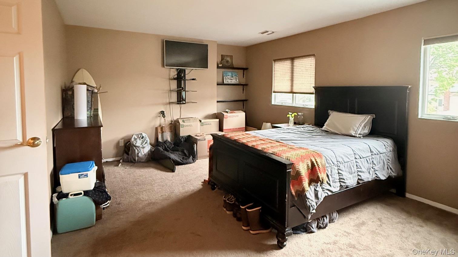 345 O'Connor Road North Babylon, NY 11703 - Photo 39 of 47 a bed room with furniture and a window