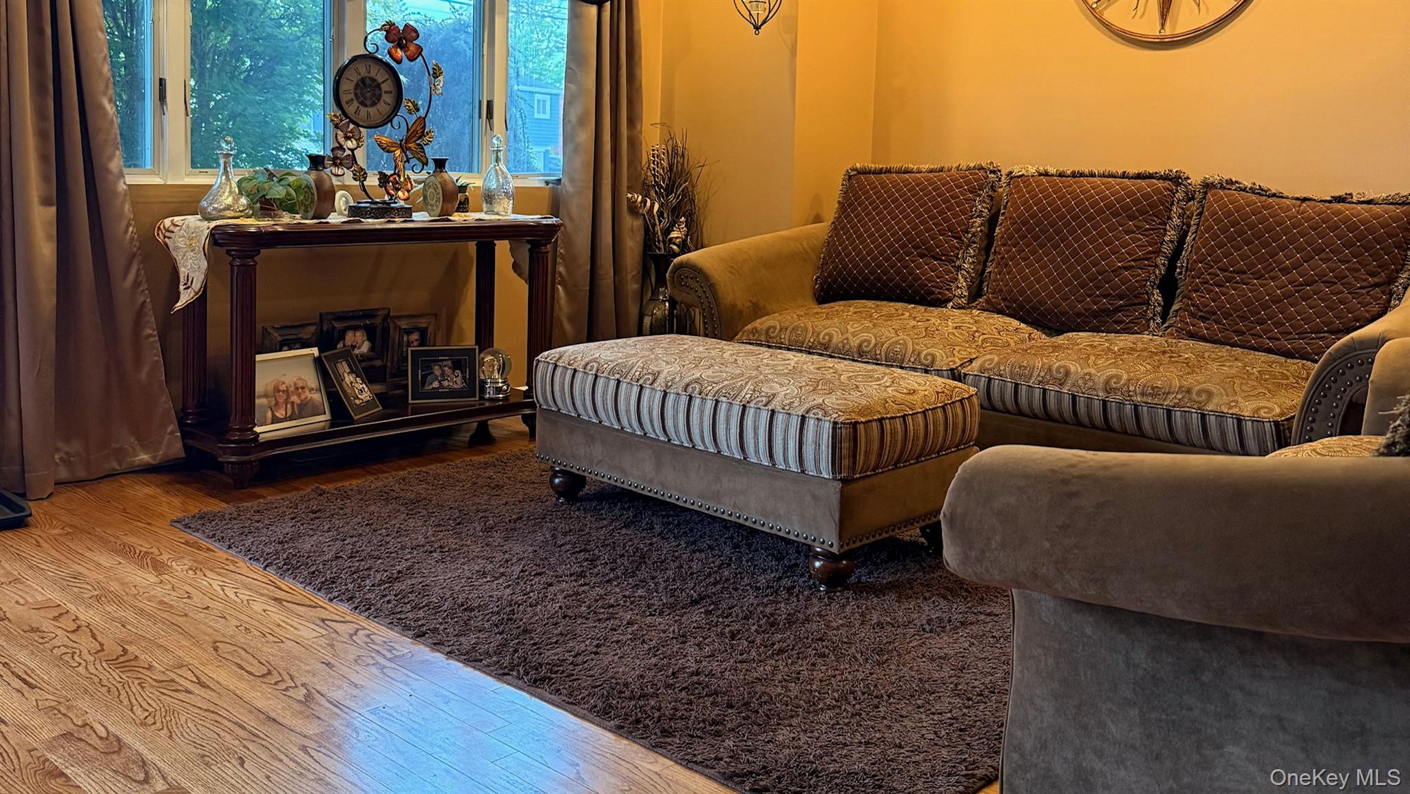 345 O'Connor Road North Babylon, NY 11703 - Photo 4 of 47 a living room with furniture and a fireplace