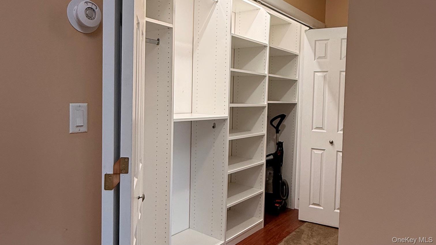 345 O'Connor Road North Babylon, NY 11703 - Photo 43 of 47 a view of walk in closet with empty racks