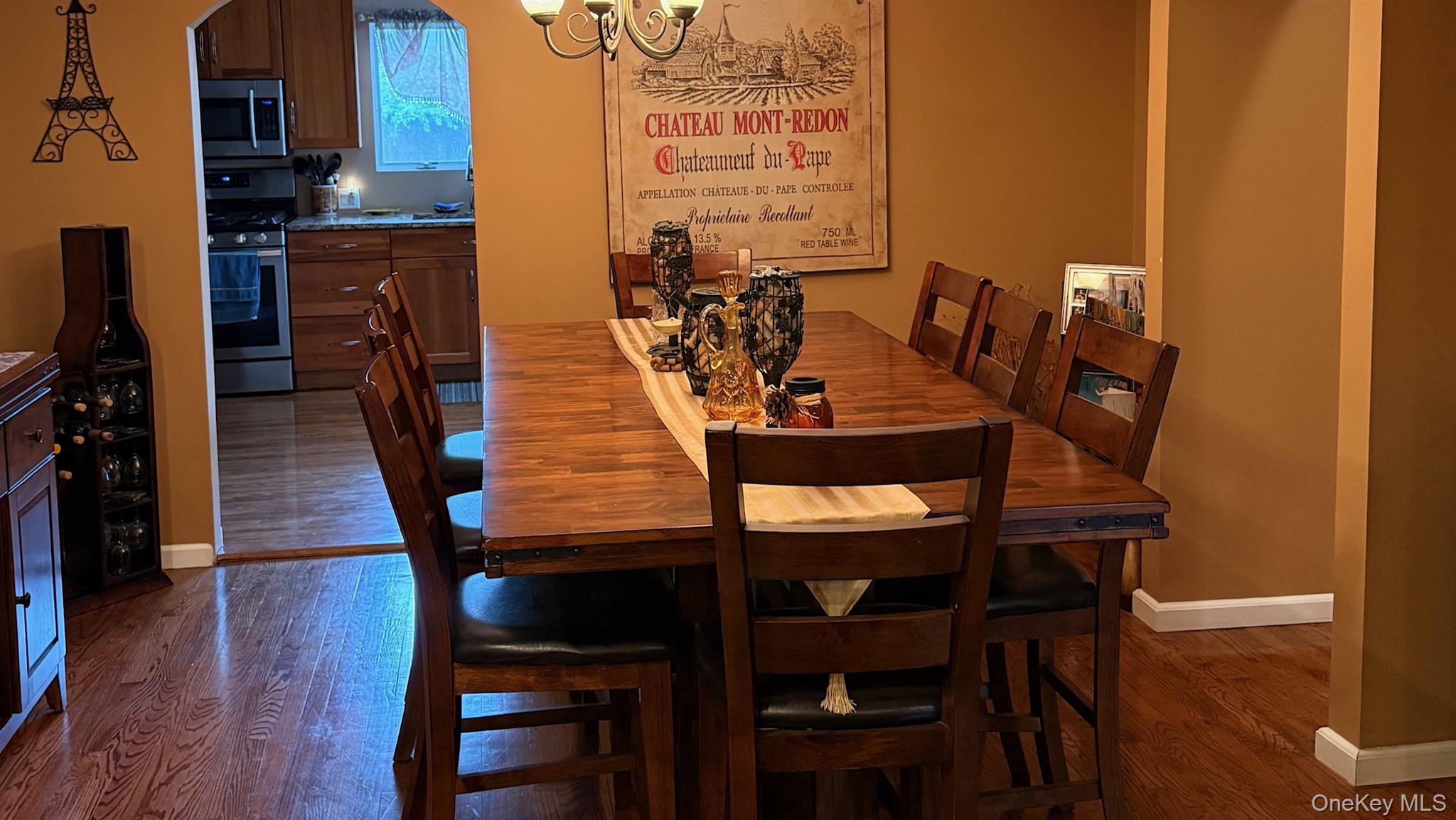 345 O'Connor Road North Babylon, NY 11703 - Photo 7 of 47 a dining room with furniture and wooden floor