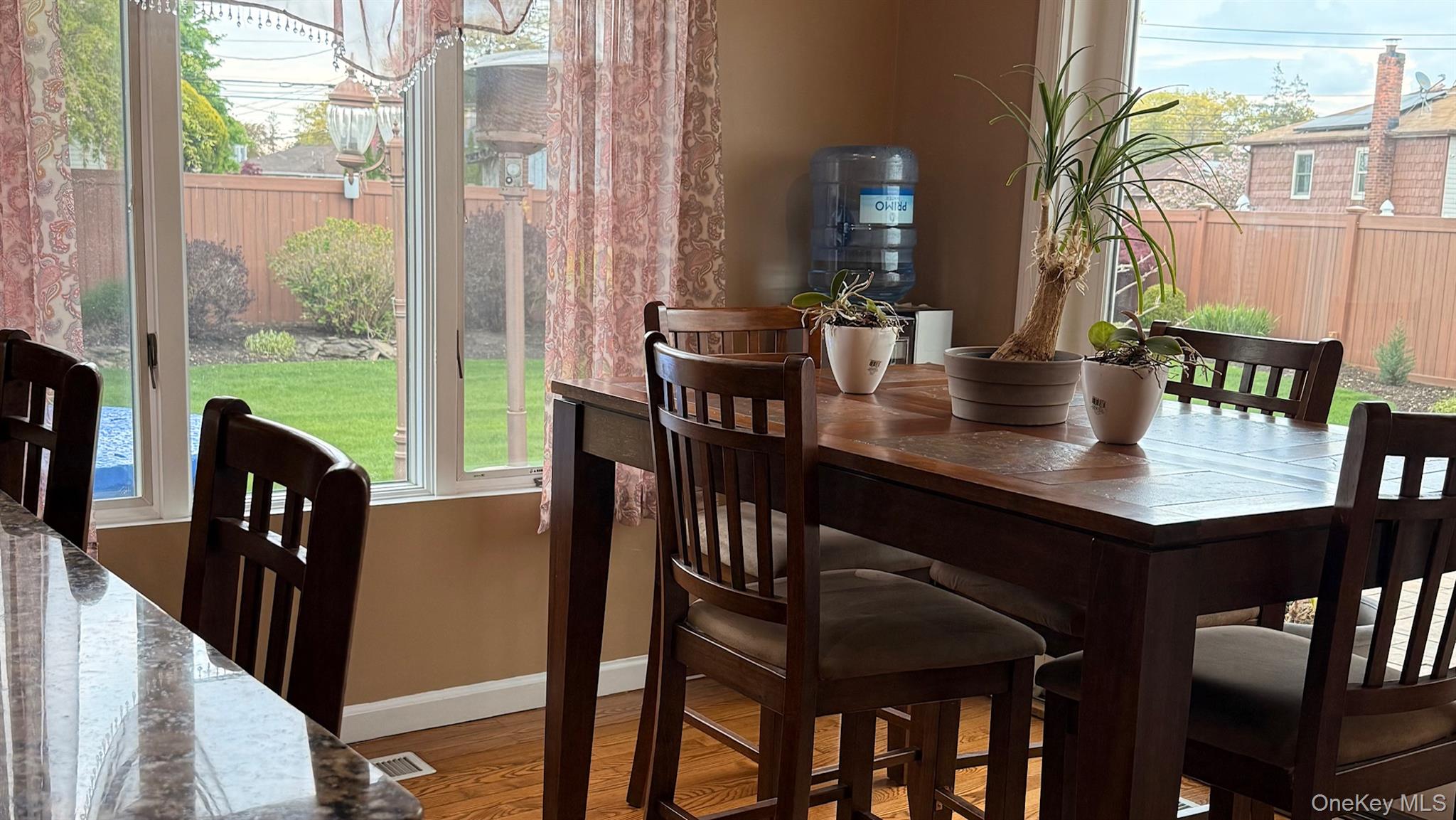345 O'Connor Road North Babylon, NY 11703 - Photo 10 of 47 a view of a dining room with furniture window and outside view