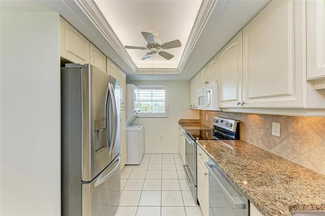 a view of an empty room and glass door