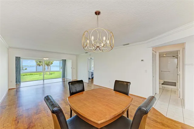 a view of a livingroom with furniture and a flat screen tv