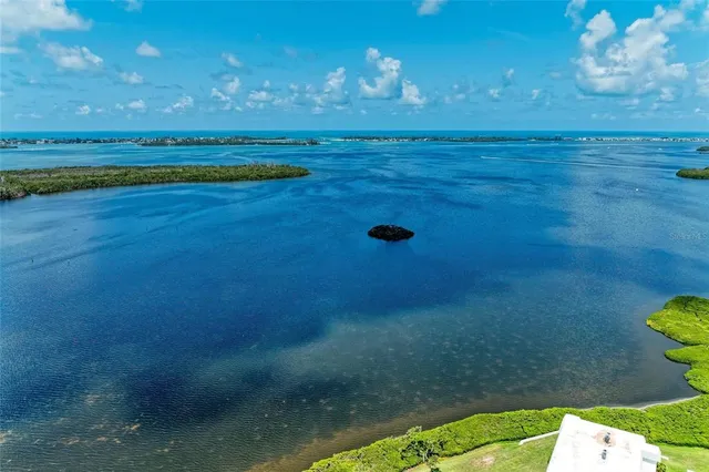 a view of a chairs and table in the patio