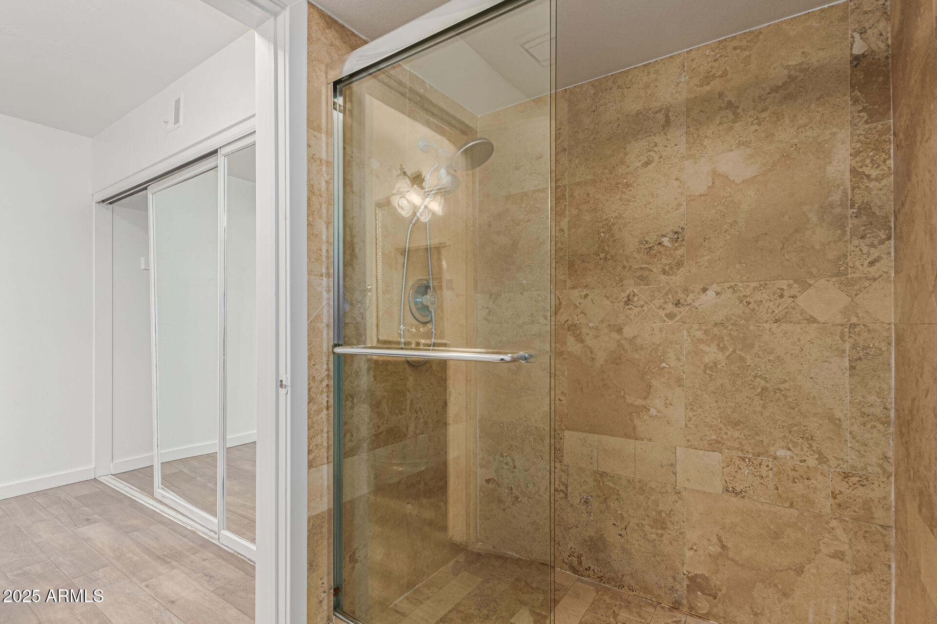 14034 North 60th Street Scottsdale, AZ 85254 - Photo 21 of 44 a bathroom with a glass shower door