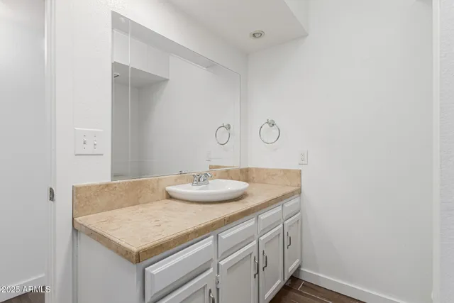 a bathroom with a sink and a bathtub