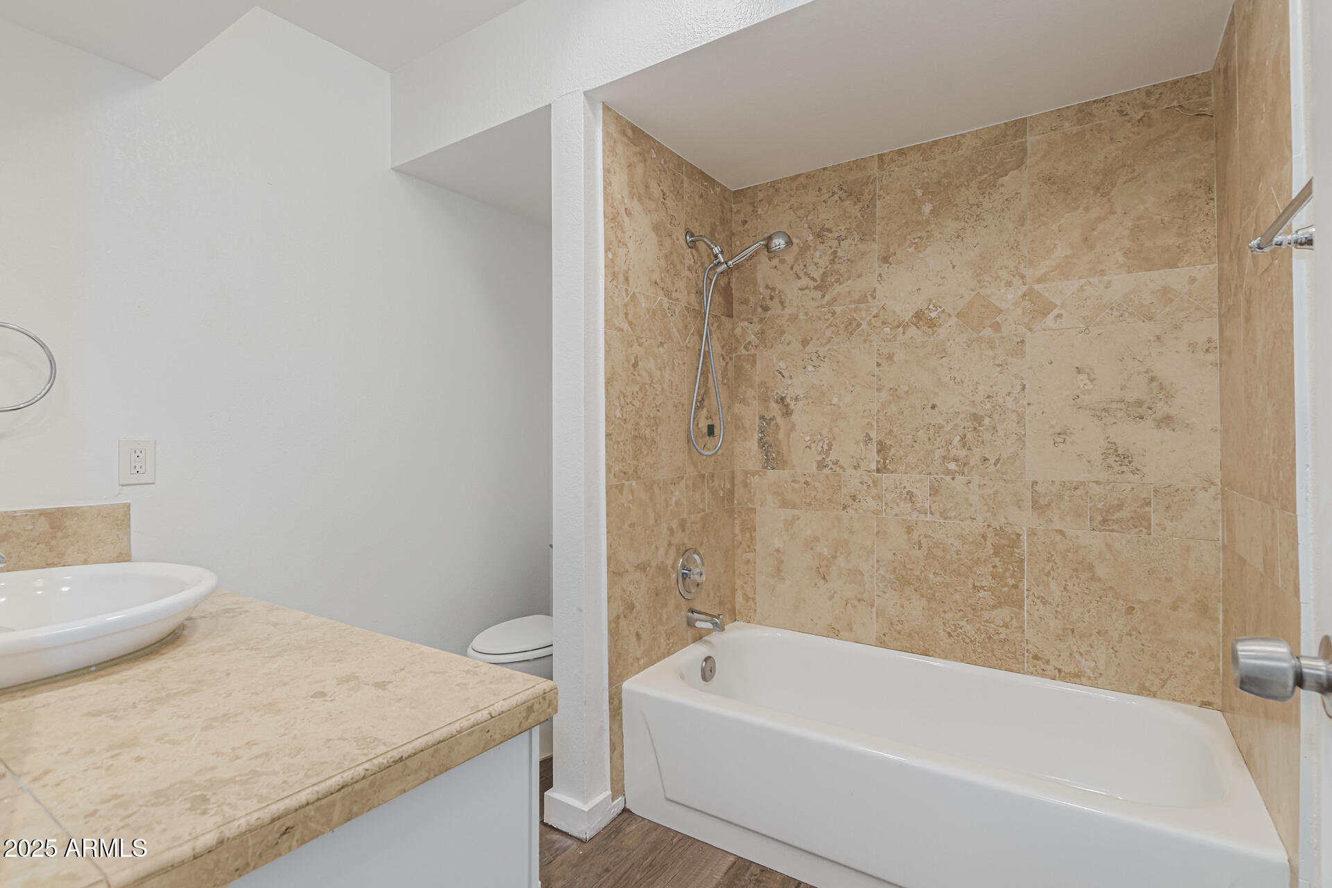 14034 North 60th Street Scottsdale, AZ 85254 - Photo 30 of 44 a bathroom with a sink and a bathtub