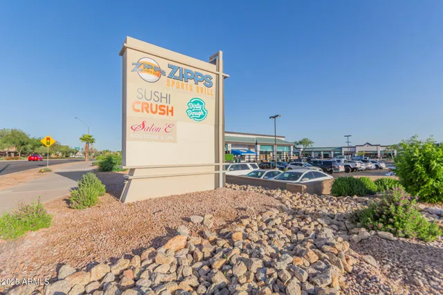 a sign on the side of the road