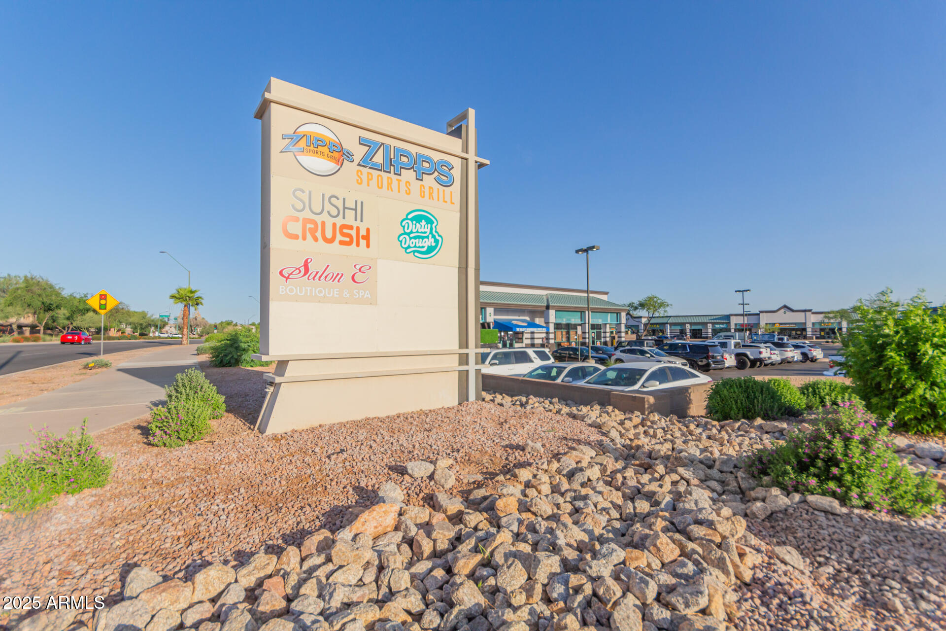 14034 North 60th Street Scottsdale, AZ 85254 - Photo 43 of 44 a front view of a house with garden