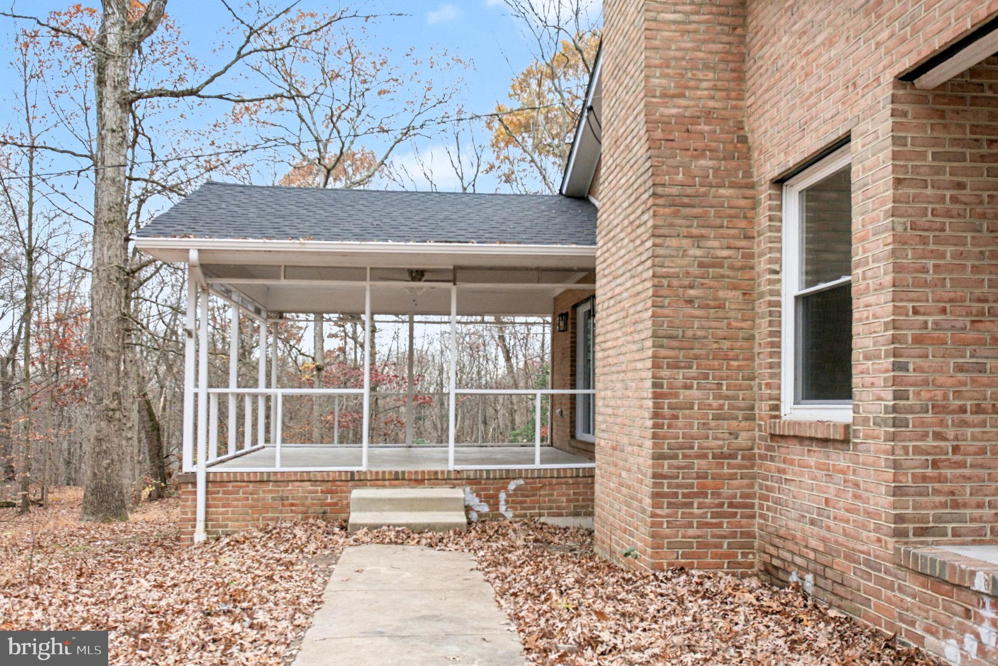 Garrett Court Elkton, MD 21921 - Photo 11 of 51 a house with a bench in front of house