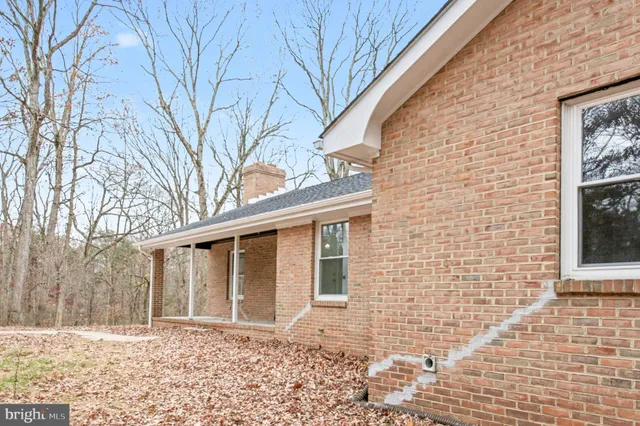 a front view of a house with a shower