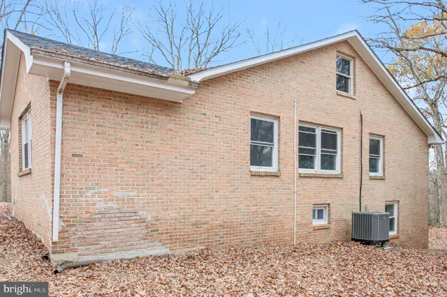 a front view of a house with yard