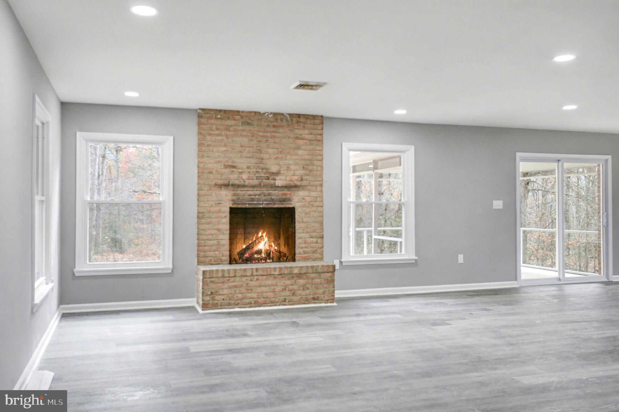 Garrett Court Elkton, MD 21921 - Photo 24 of 51 a view of an empty room with a window and fireplace