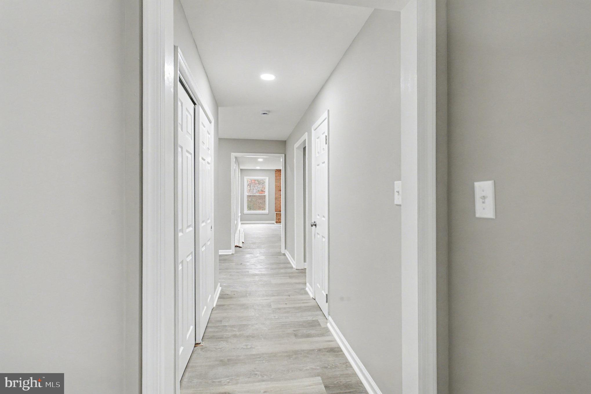 Garrett Court Elkton, MD 21921 - Photo 25 of 51 a view of a hallway with wooden floor
