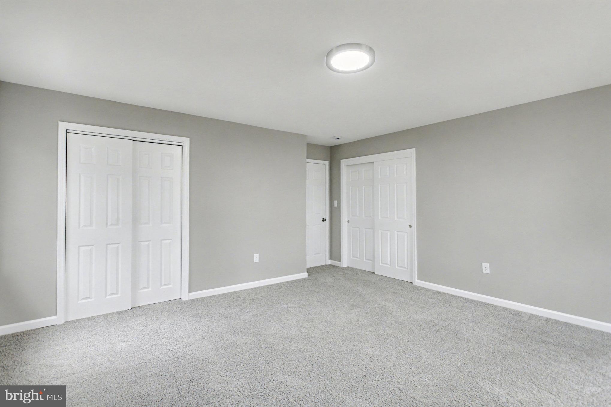Garrett Court Elkton, MD 21921 - Photo 32 of 51 a view of an empty room and chandelier fan