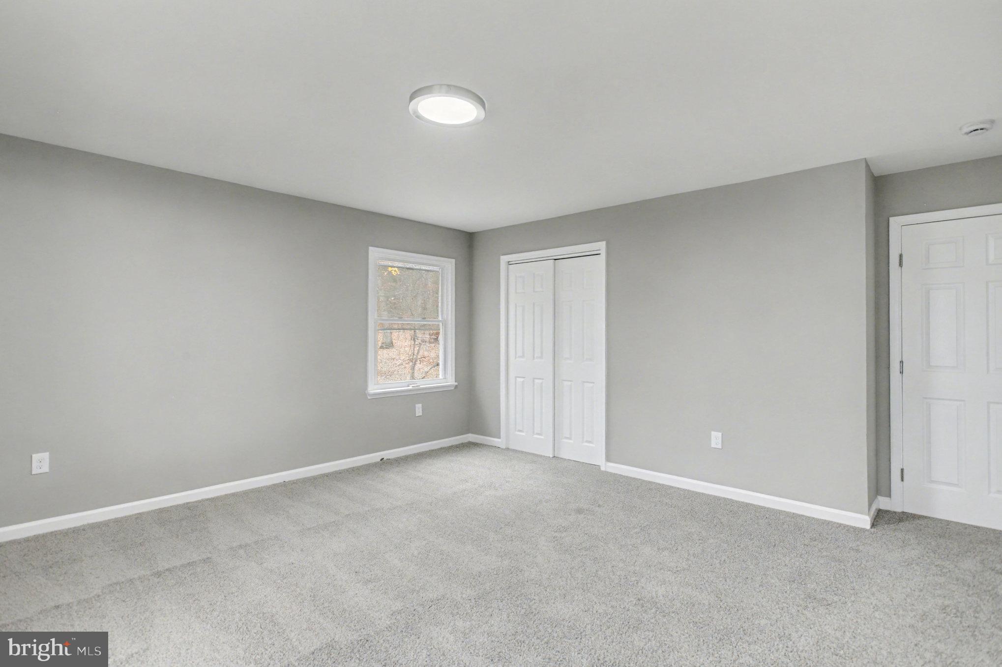 Garrett Court Elkton, MD 21921 - Photo 33 of 51 a view of an empty room with a window