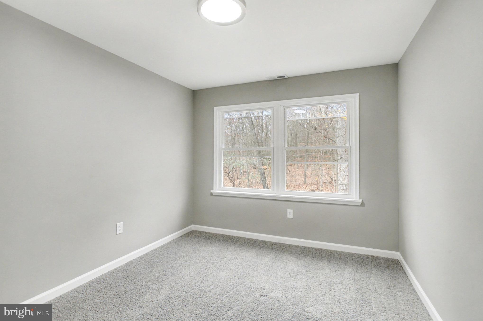 Garrett Court Elkton, MD 21921 - Photo 36 of 51 an empty room with windows