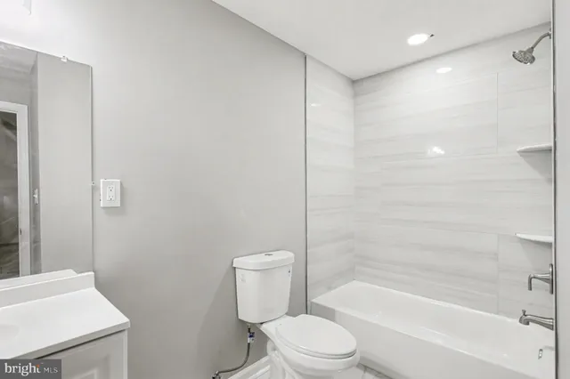 a view of a hallway with stairs