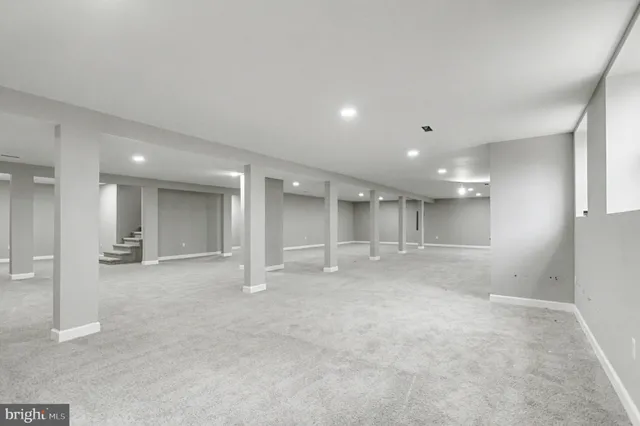 an empty room with closet area