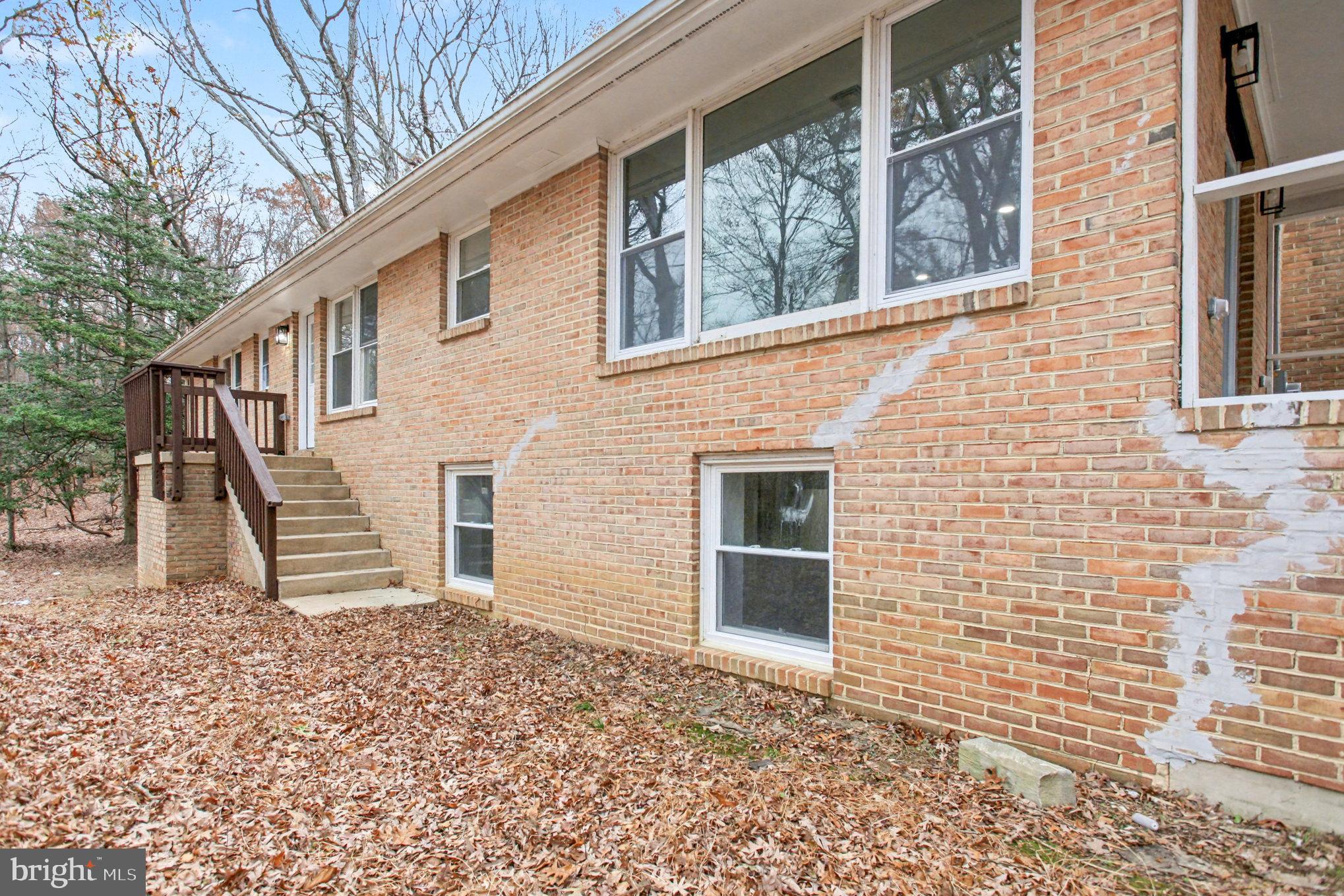 Garrett Court Elkton, MD 21921 - Photo 7 of 51 a front view of a house with a garden