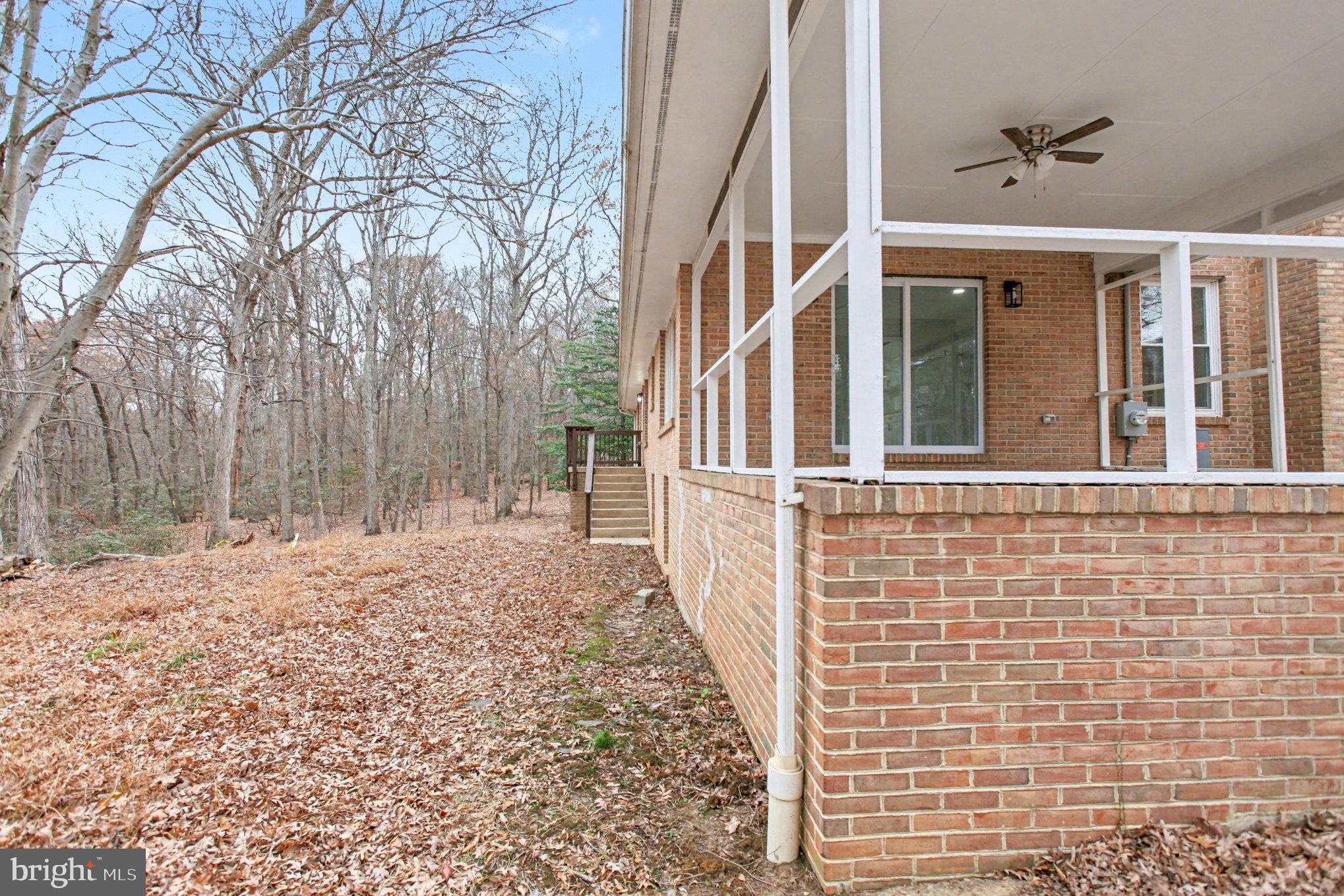 Garrett Court Elkton, MD 21921 - Photo 8 of 51 a view of a brick house next to a yard